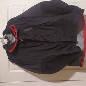 Marmot mens black high end rain jacket with multiple zippered waterproof pocket